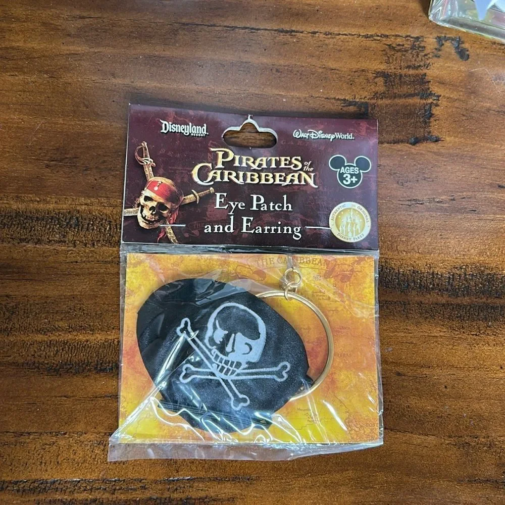 Disneyland Pirates of the Caribbean Eye patch and earring NEW original